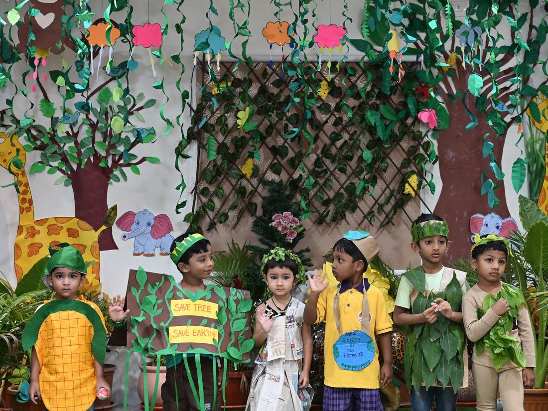 Primary School Primary students writing at their desks in a classroom